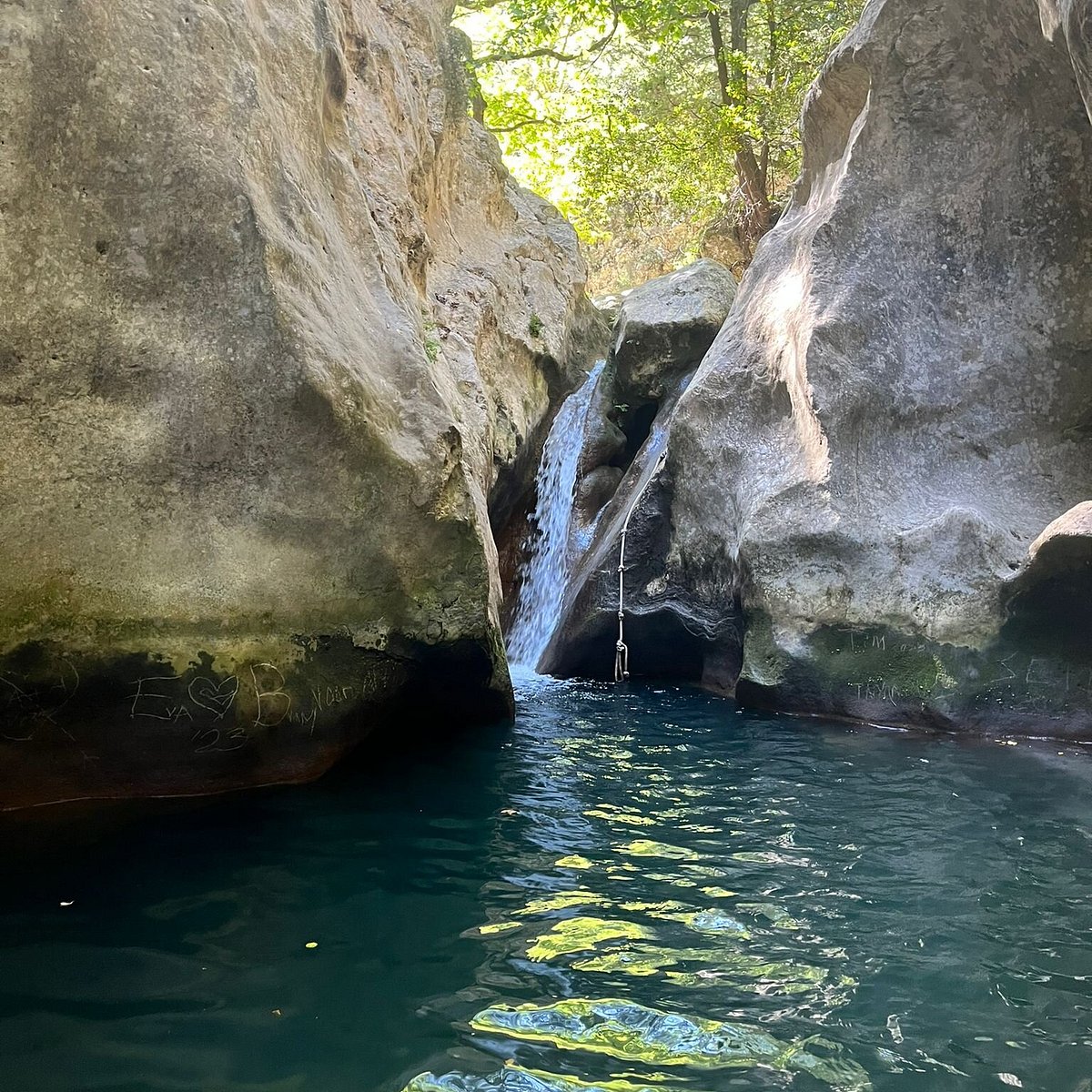Spectacular Potami waterfalls cascading into natural crystal-clear pools
